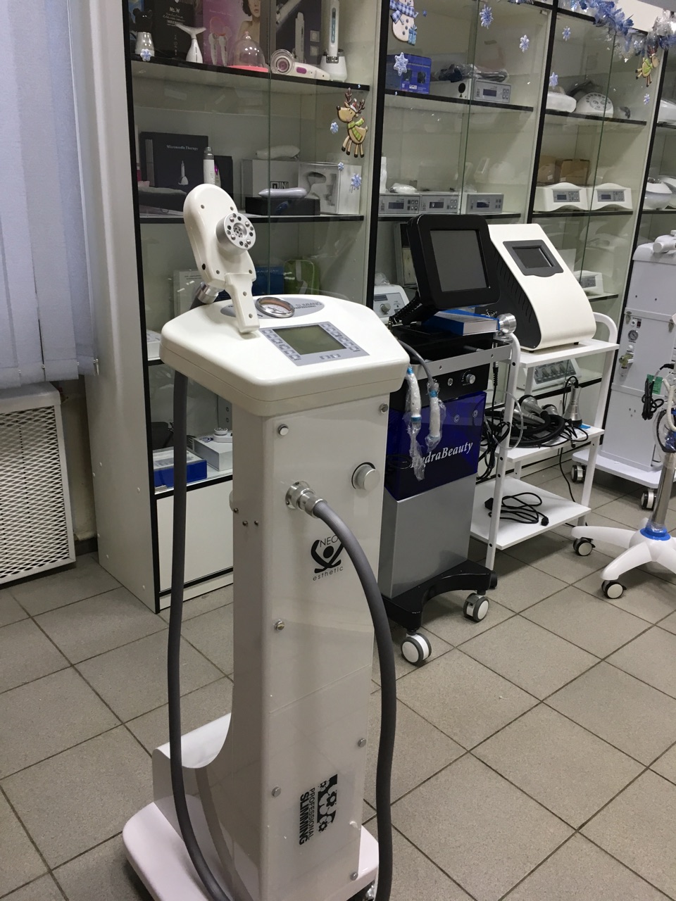 Аппарат вакуумно-роликового массажа с хромотерапией Slimming D-528_1